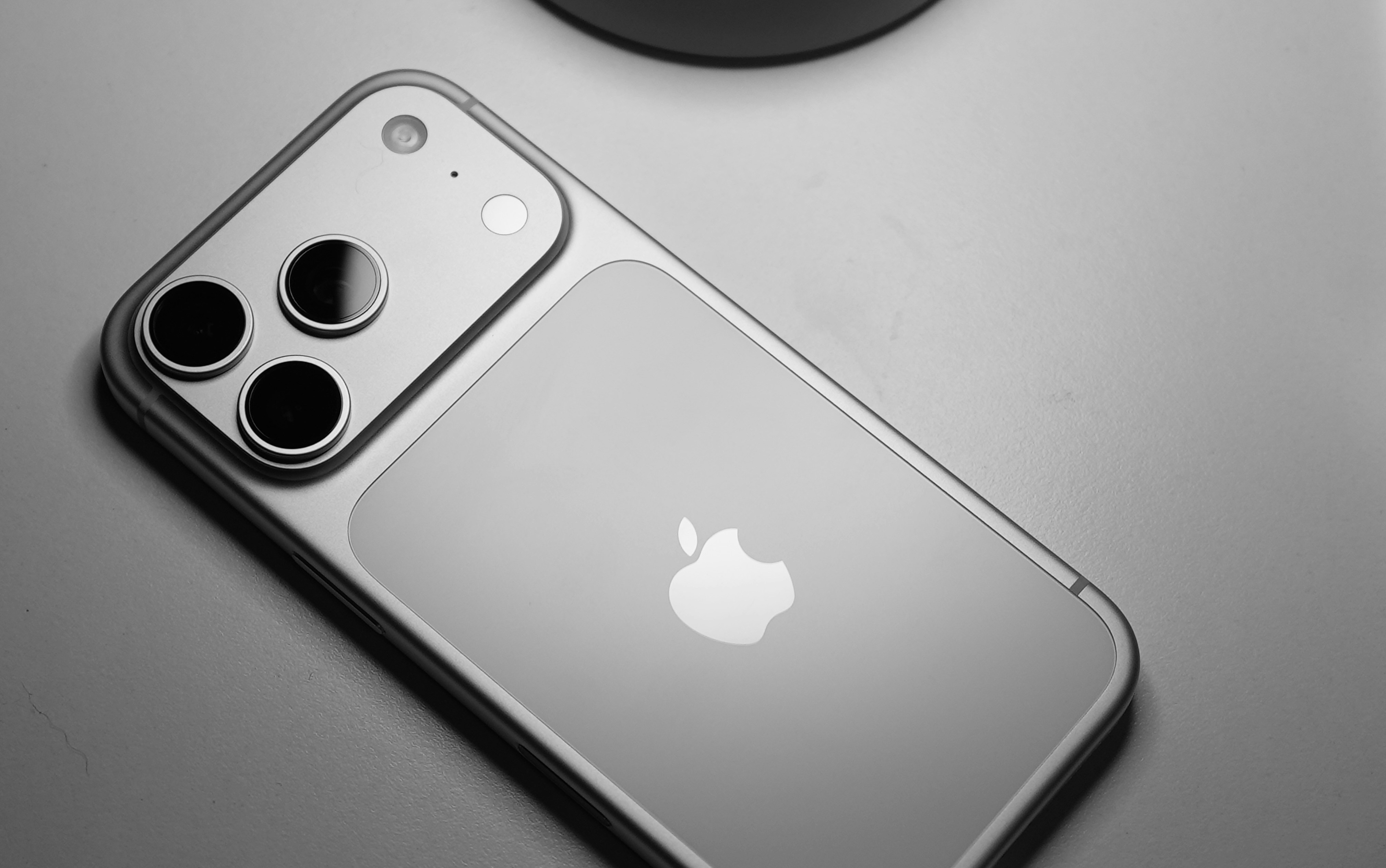 Silver iPhone triple camera