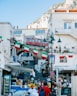 Italian flags and funicular on a sunny street.