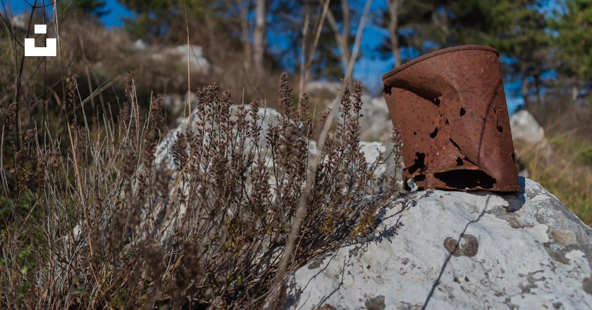 Rusting Ong Rocks A rusty can sits on a rock outdoors. photo – Free Rock Image on Unsplash