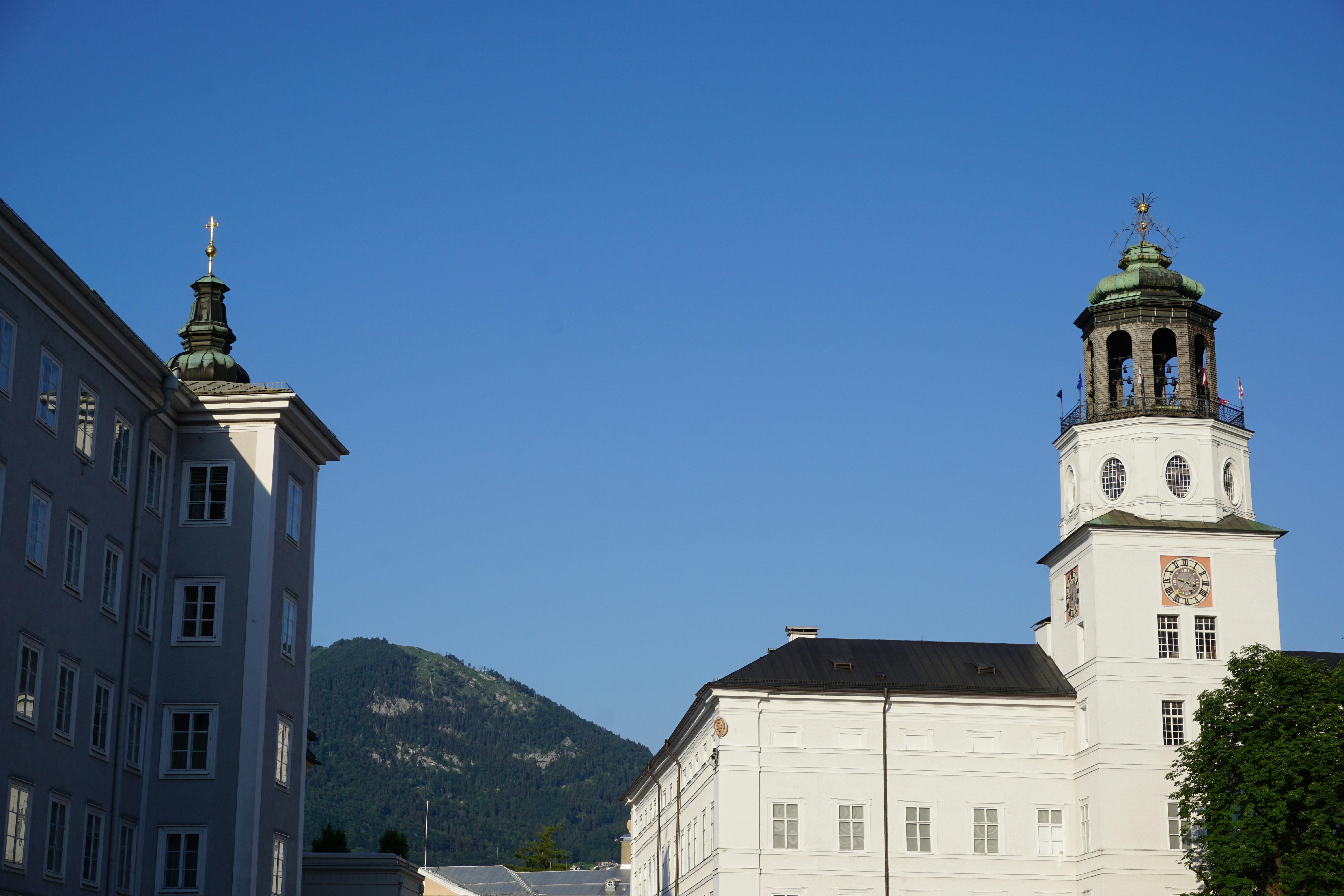 Historic buildings against a clear blue sky