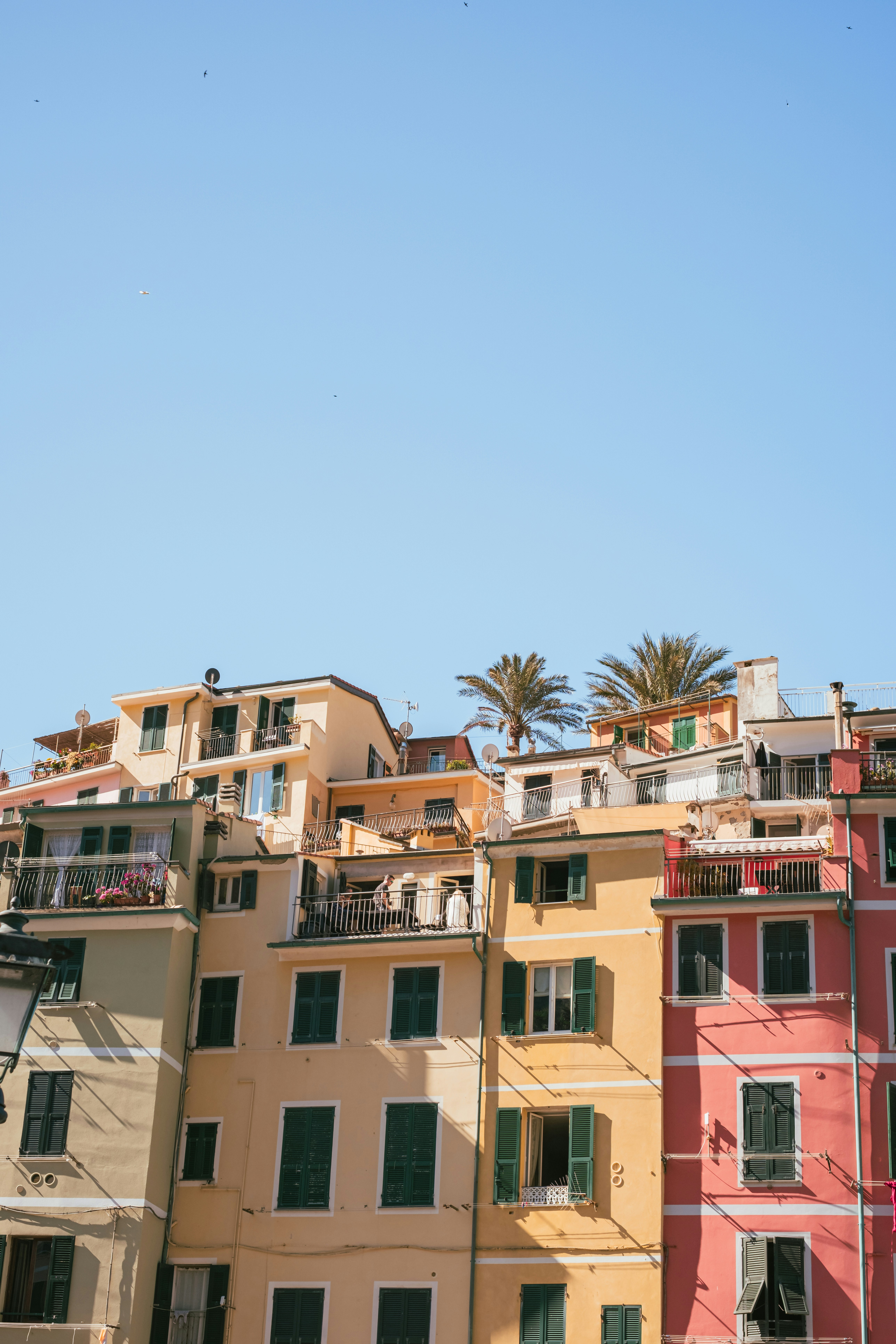 Colorful buildings under a clear blue sky.