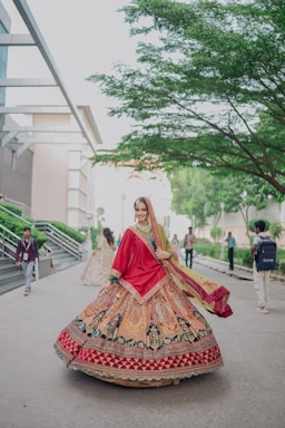 A woman in a colorful traditional indian outfit