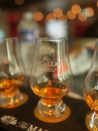 Whiskey tasting glasses with amber liquid