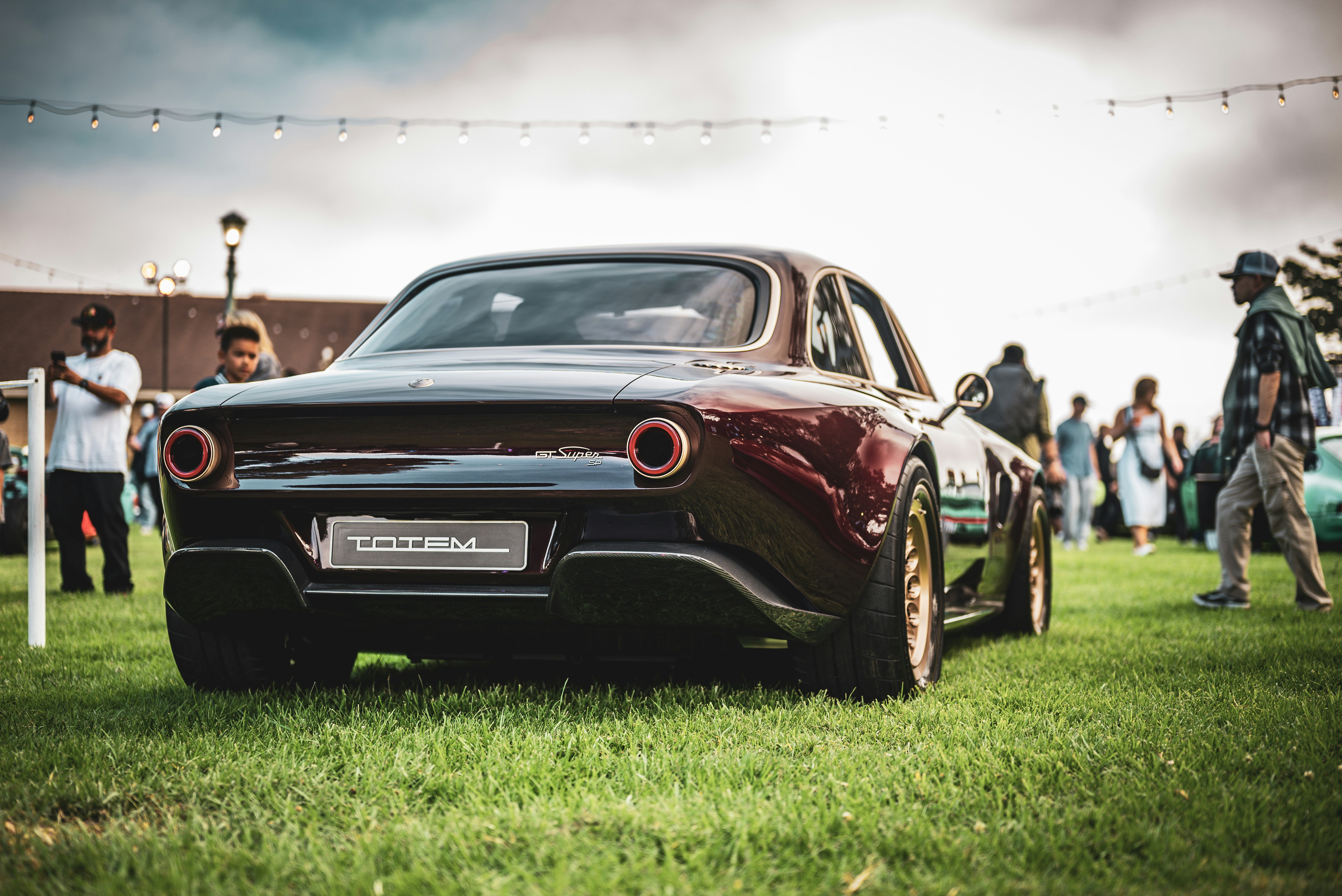 The Totem Automobili Super GT SP is a handcrafted Italian grand tourer powered by a 3.2L V6, captured at the Monterey Motorsports Festival 2025. It combines timeless design, modern performance, and exquisite carbon fiber craftsmanship.