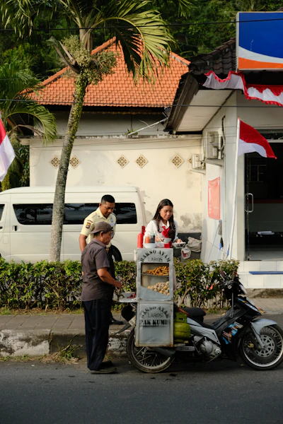 Street vendor selling snacks from a cart