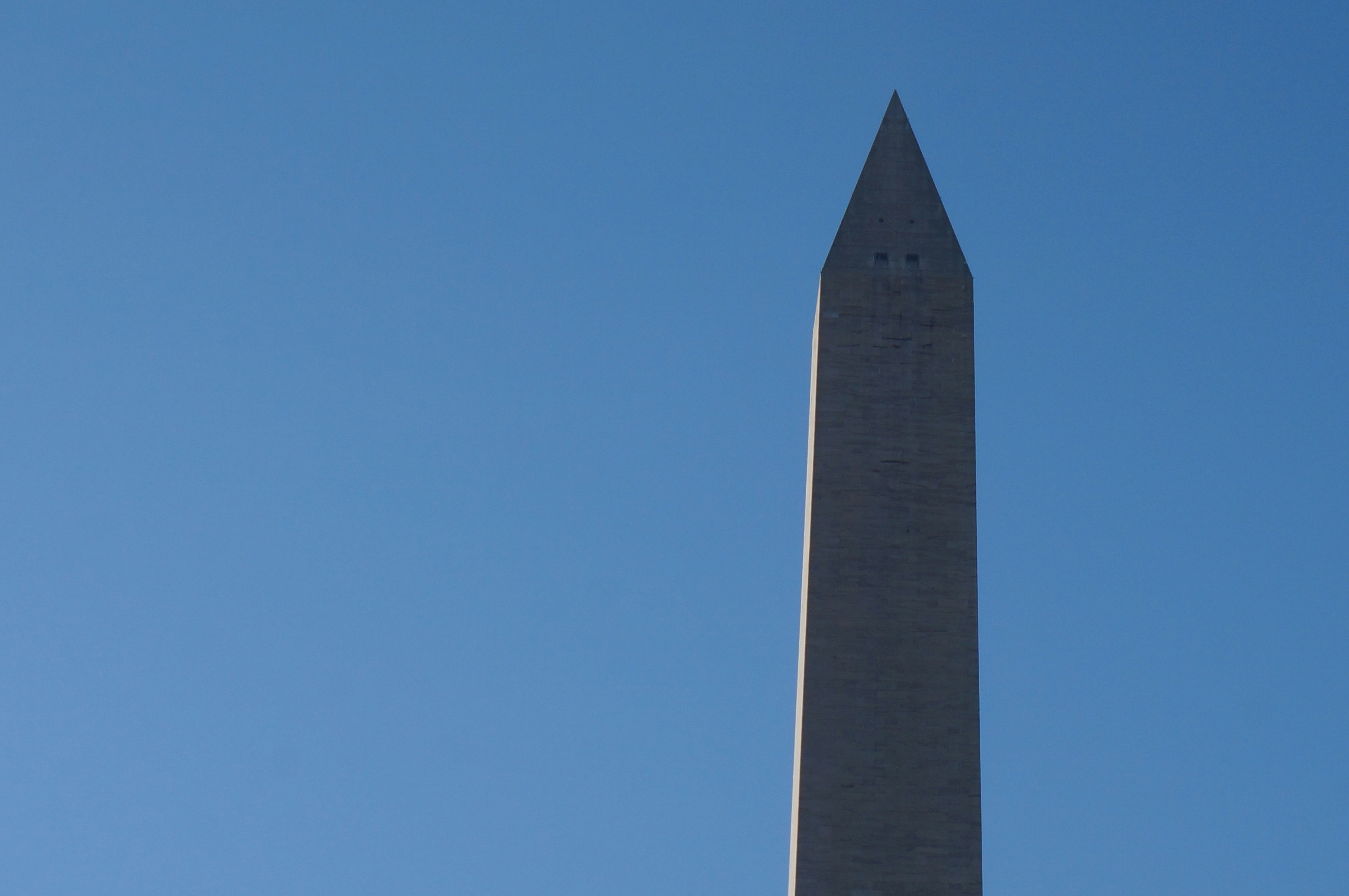 The washington monument against a clear blue sky