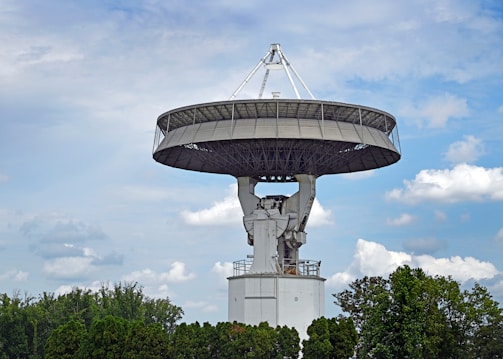 Large radio telescope against a cloudy sky