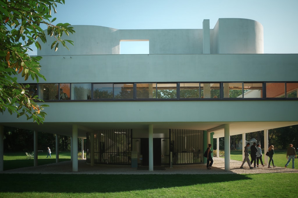 Casa Montjuic: A modernist concrete villa with clean geometric lines and minimalist white facades