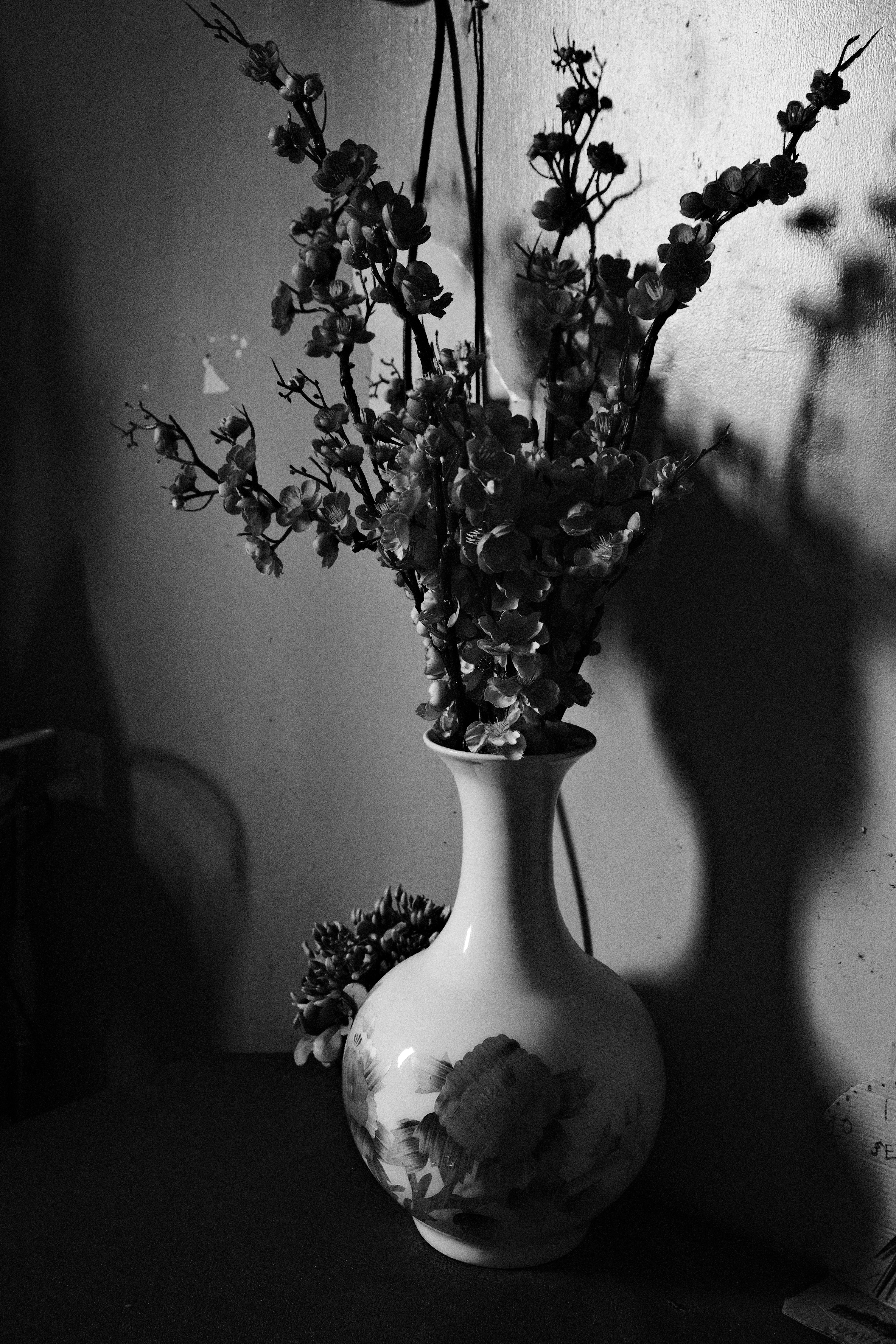 A vase with flowers on a table
