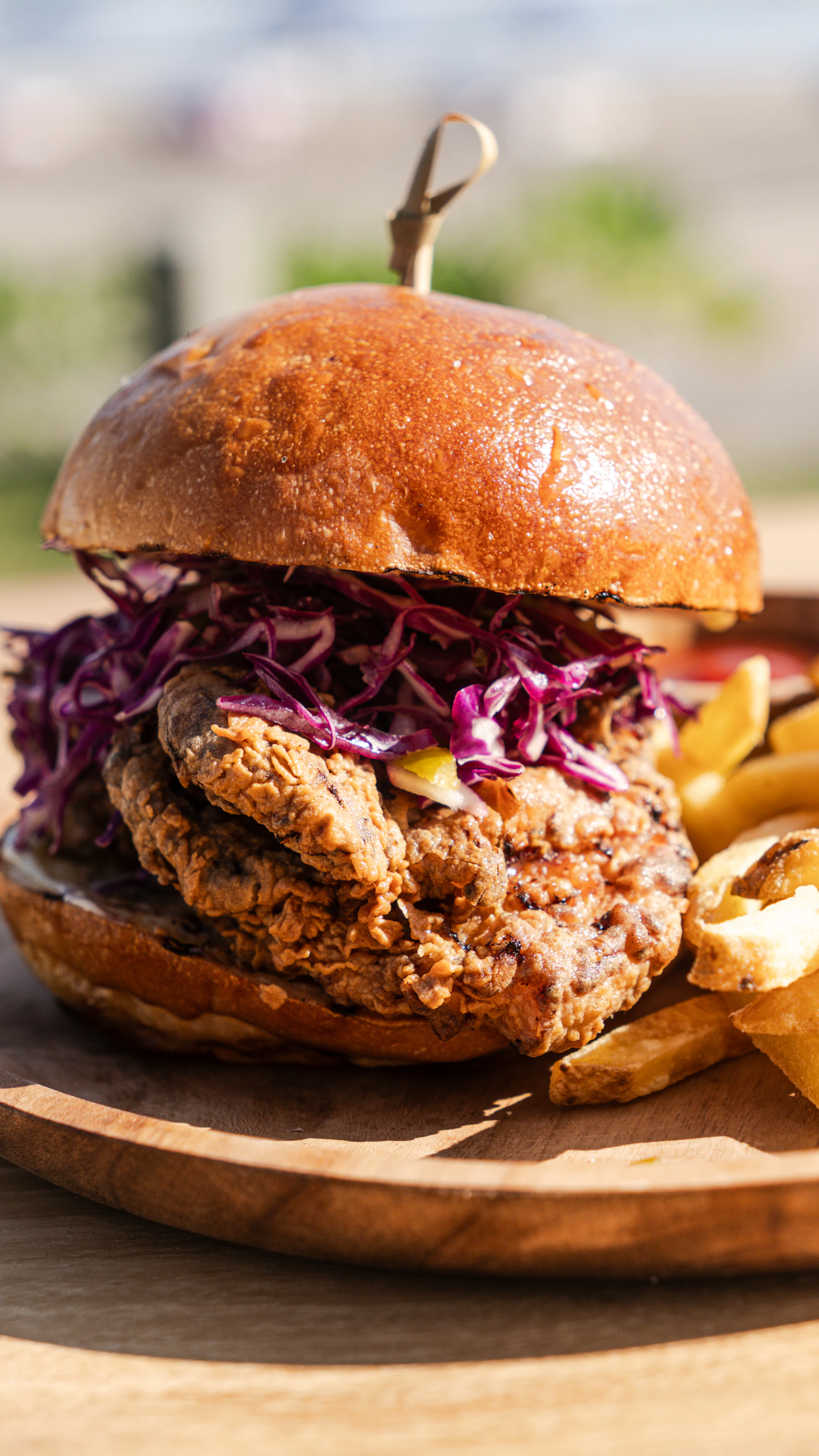 Fried chicken sandwich with coleslaw and fries