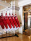 Row of singapore flags displayed indoors
