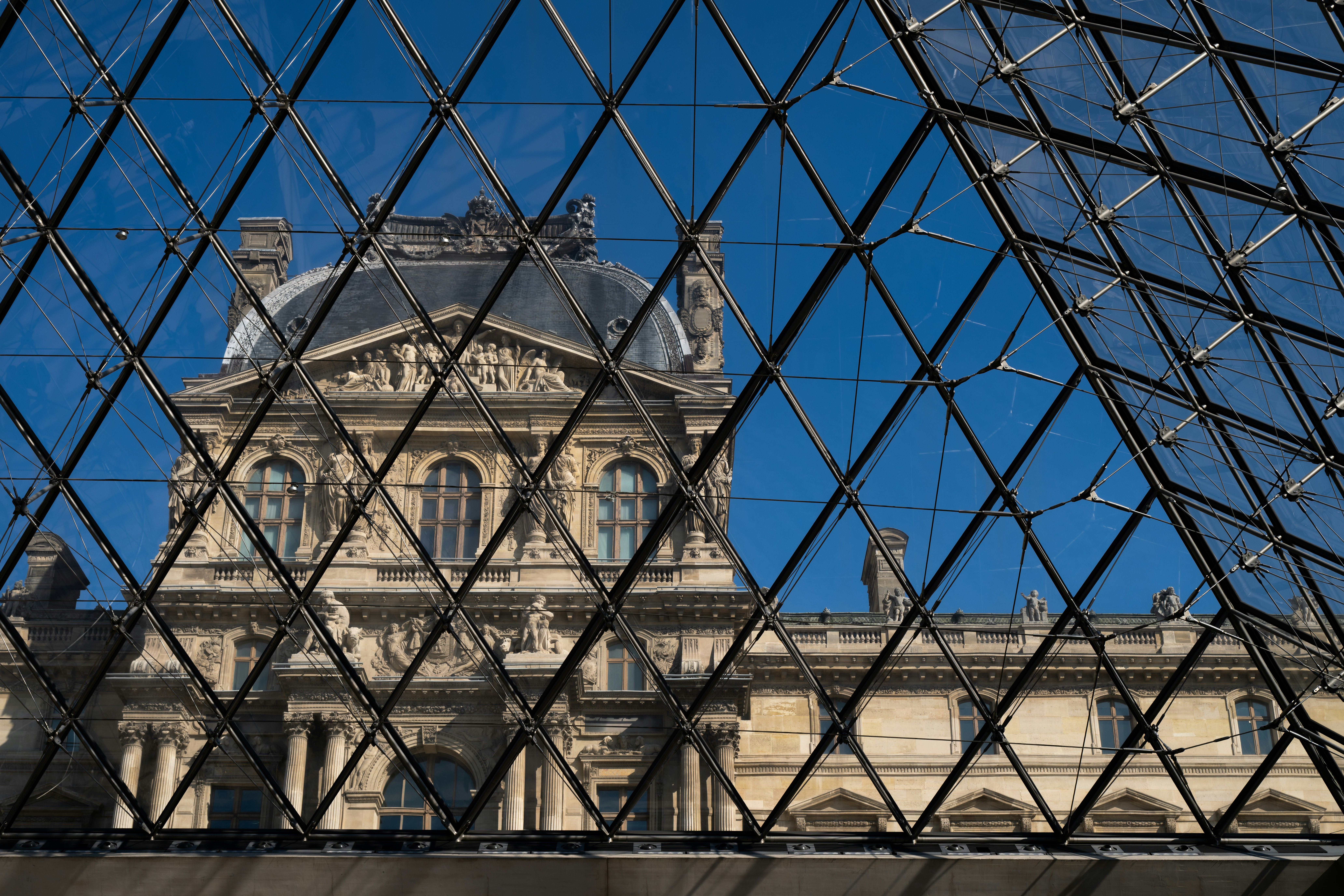 Glass pyramid at the Louvre Museum - Best Paris tours