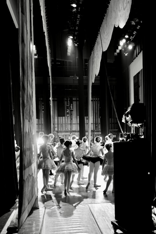 Ballet dancers in tutus backstage before a performance