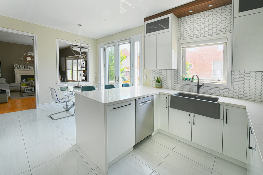 Kitchen with hexagon tile backsplash and farmhouse sink