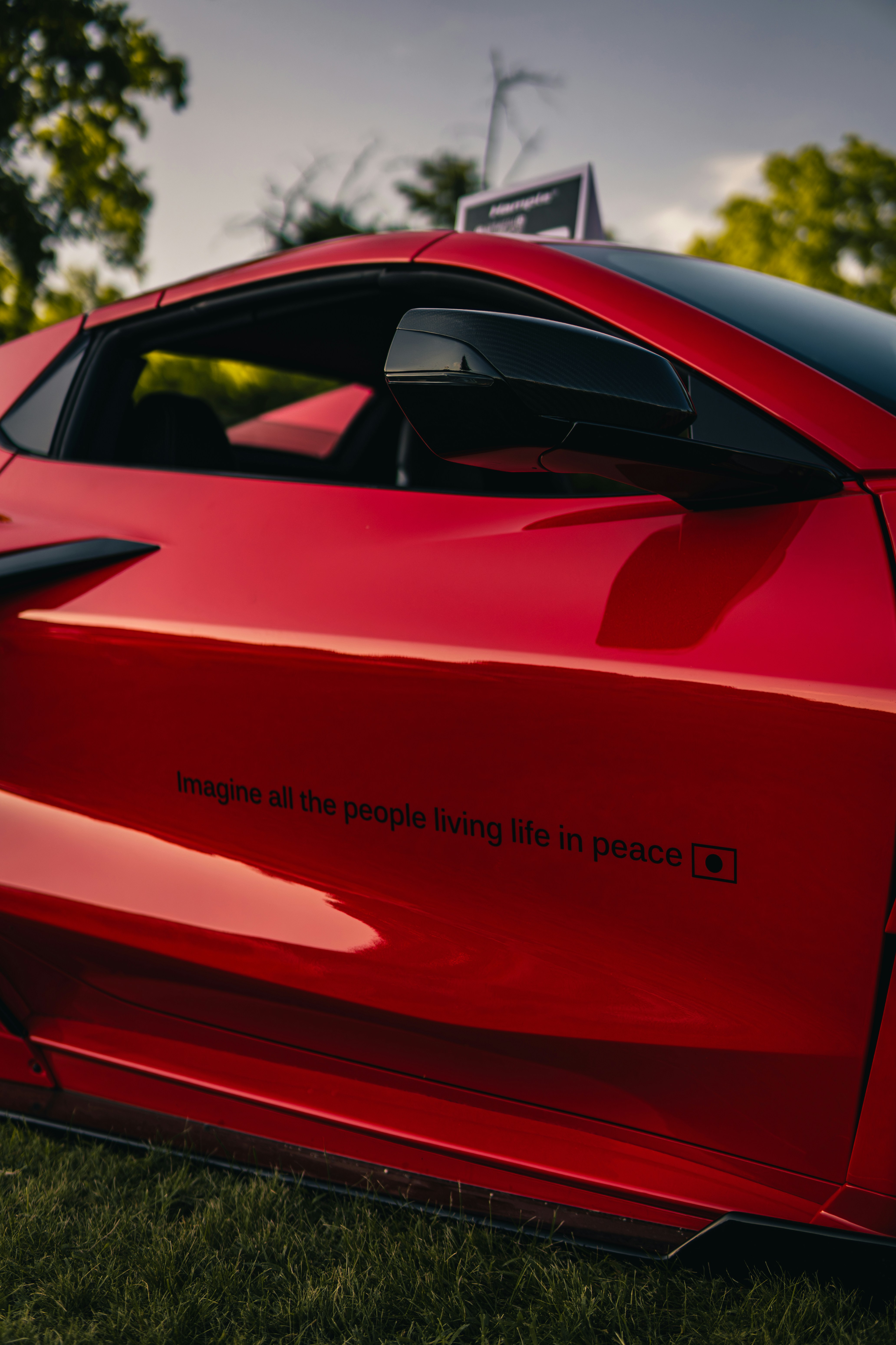 Red car with text on the door photo – Free Sports car Image on Unsplash
