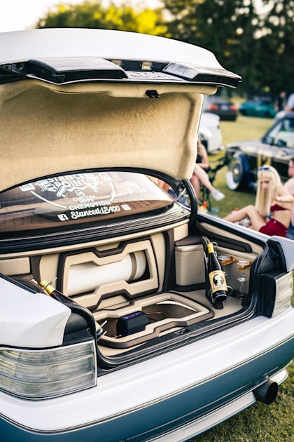 Custom car trunk with subwoofer sound system installed showing proper mounting depth and clearance for accurate bass