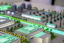 Miniature industrial complex with glowing lights
