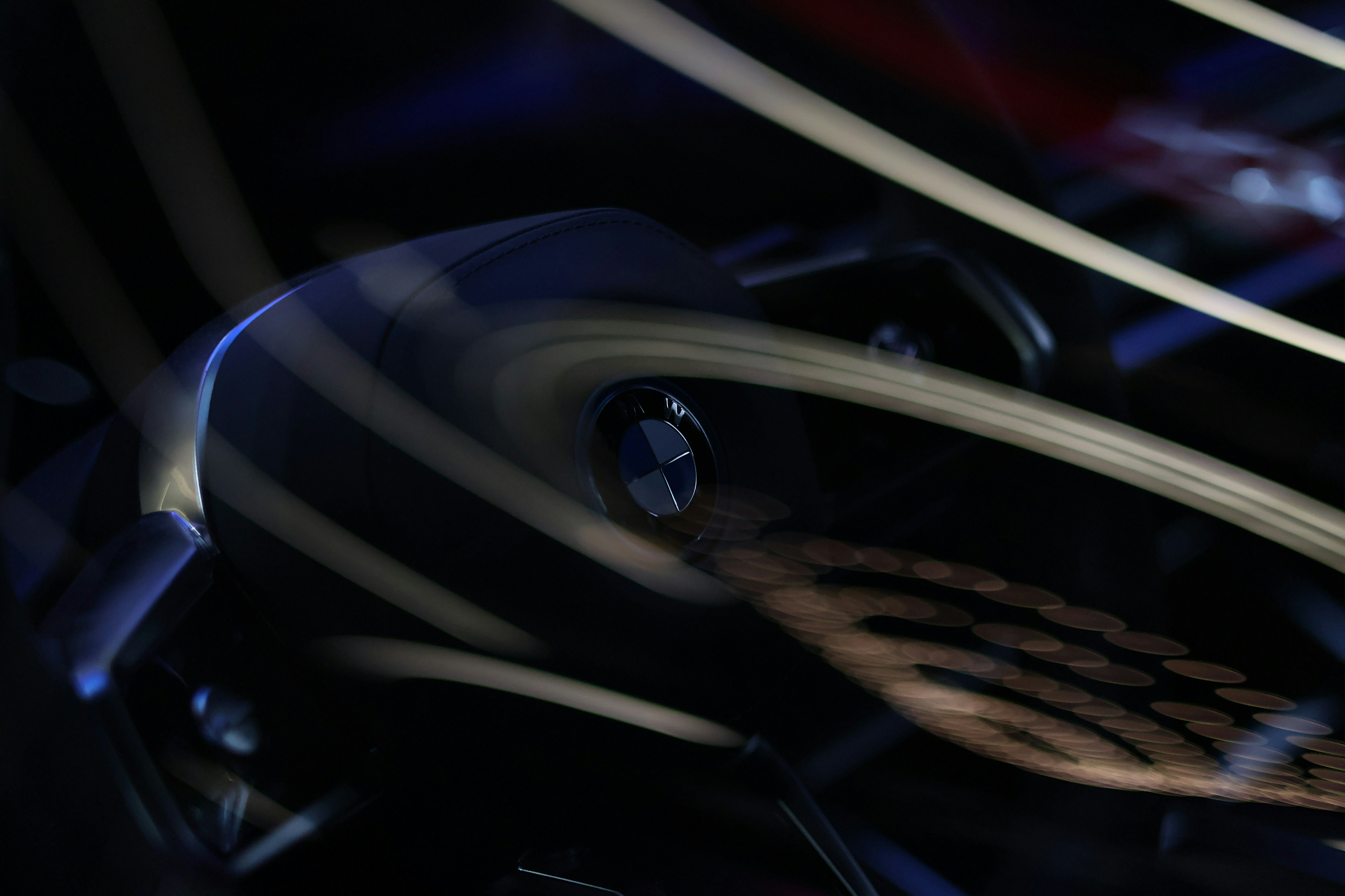Abstract motion blur of a car's emblem