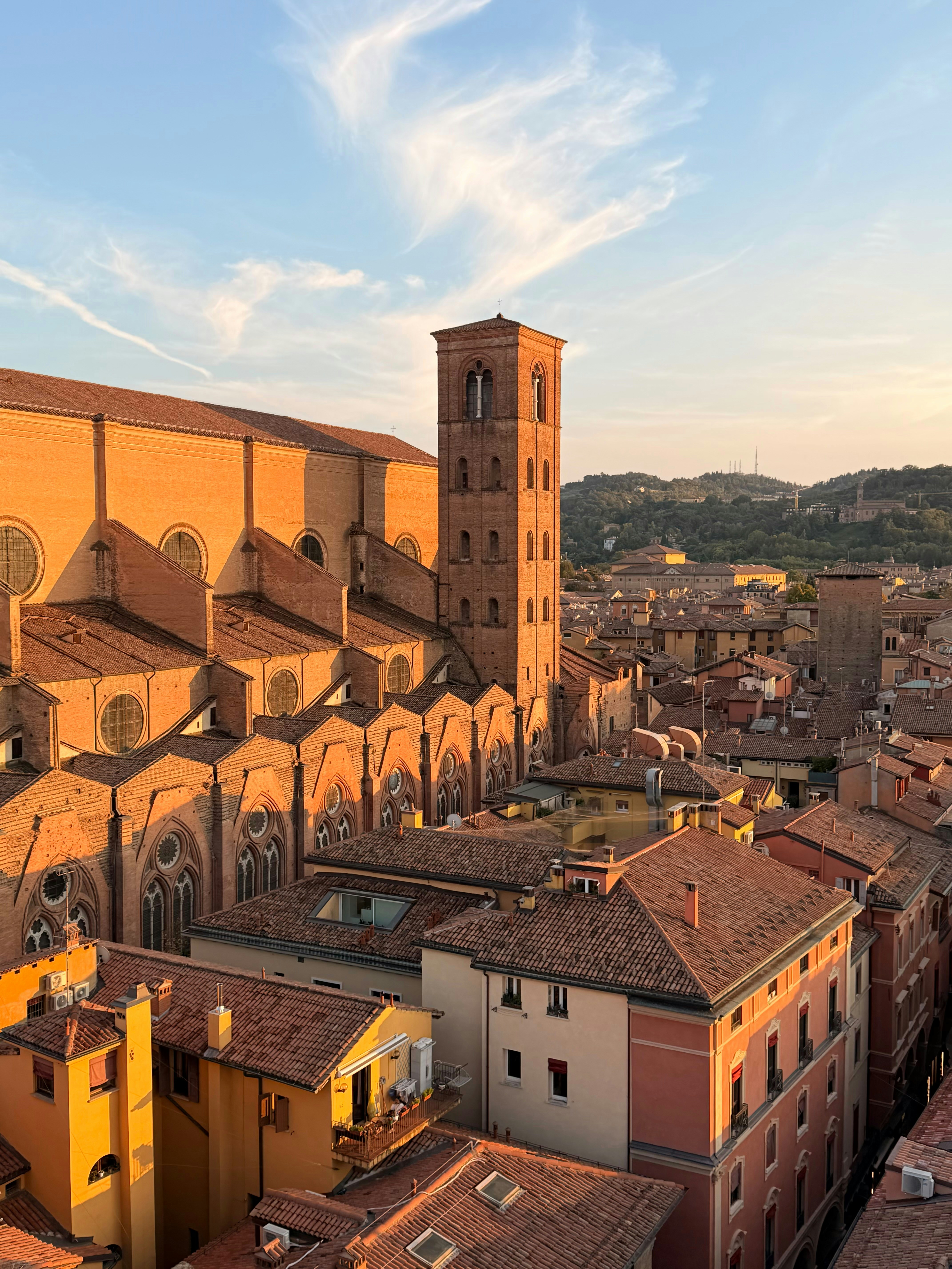Historic italian city rooftops at sunset