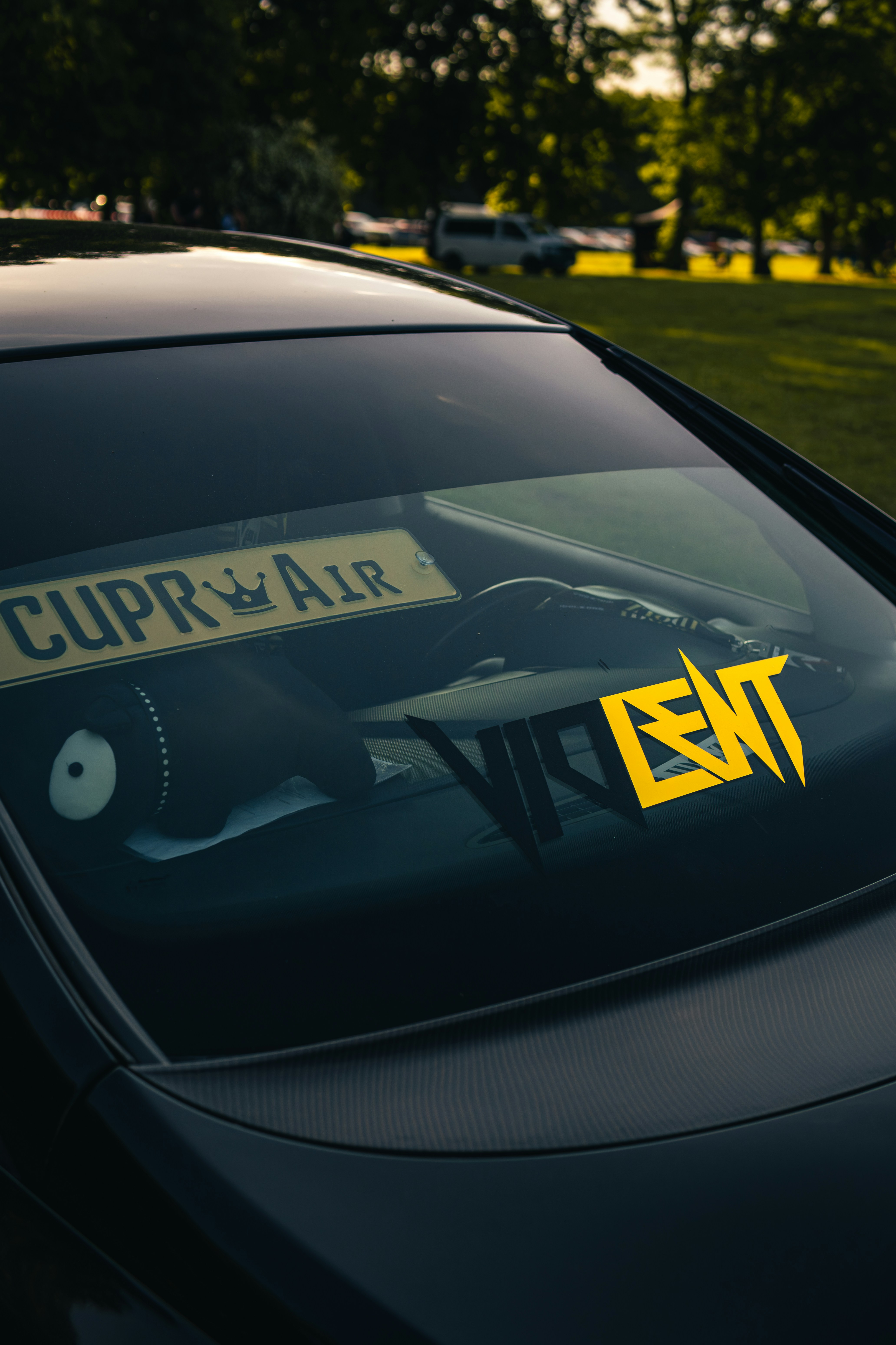 Yellow sticker on a car windshield