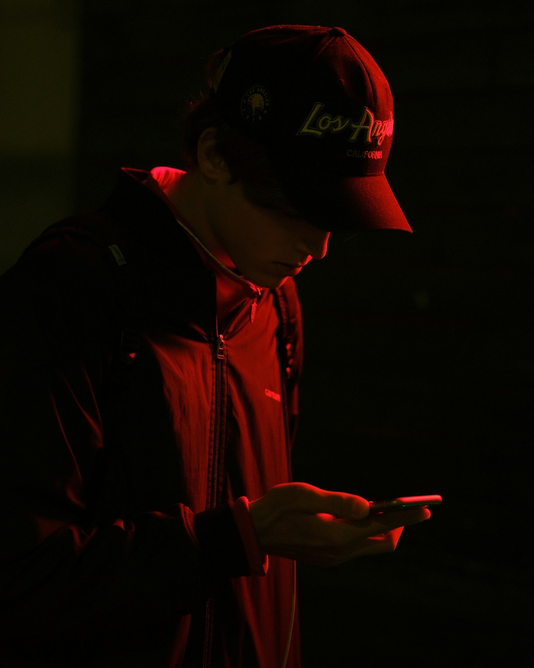 person checking phone late at night concerned