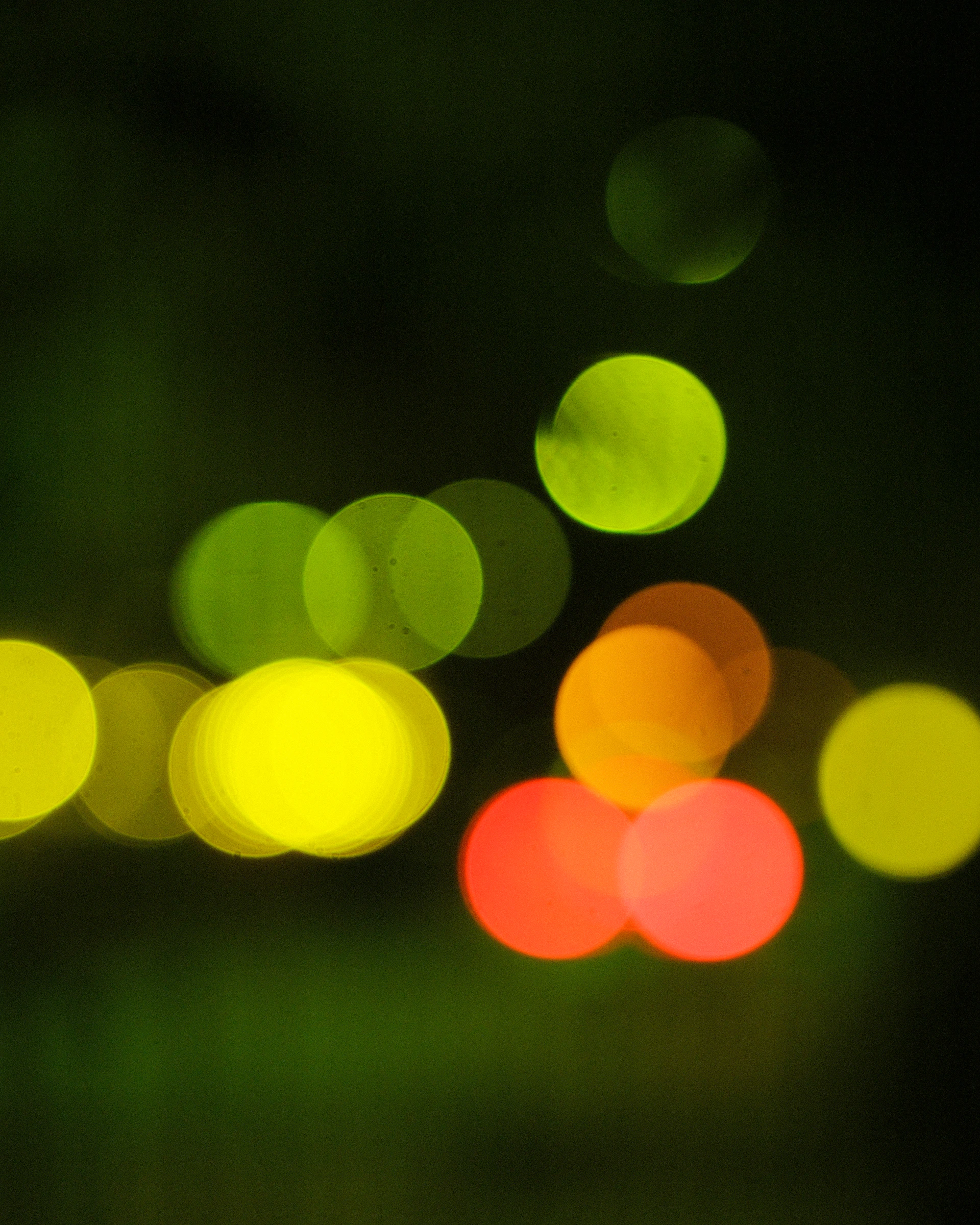 Blurred colorful lights on a dark background.