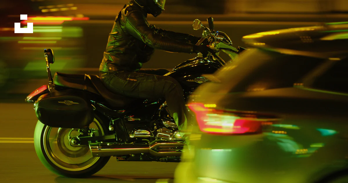 Motorcycle Riding Night Person riding a motorcycle at night photo – Free Motorcycle Image on ...