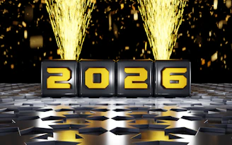 The year 2026 displayed on cubes with fireworks.