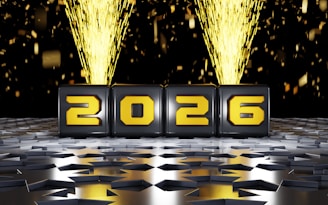 The year 2026 displayed on cubes with fireworks.