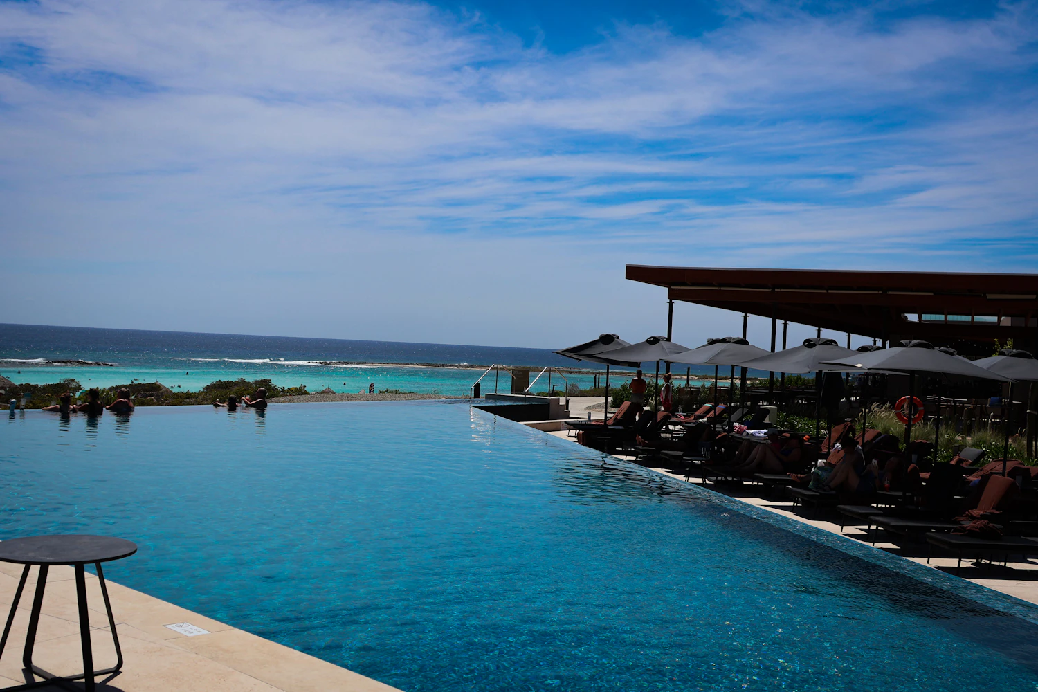 A serene infinity pool overlooking the sea