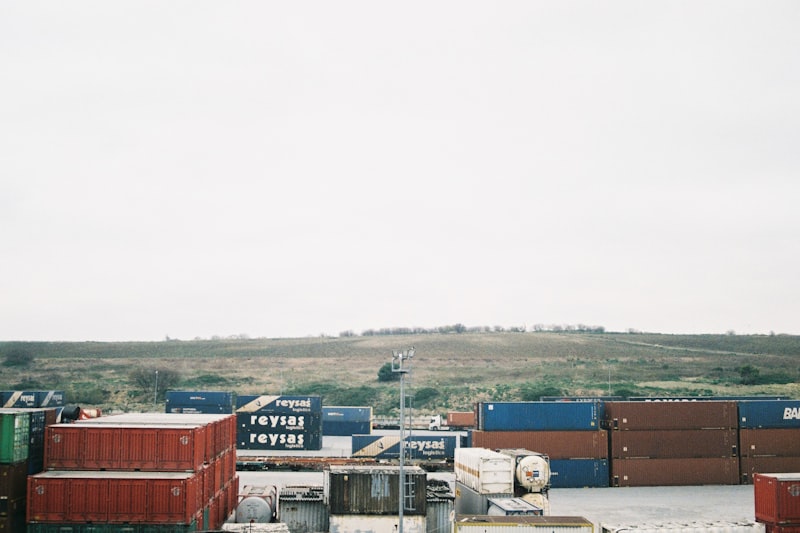 Stacked shipping containers in a yard
