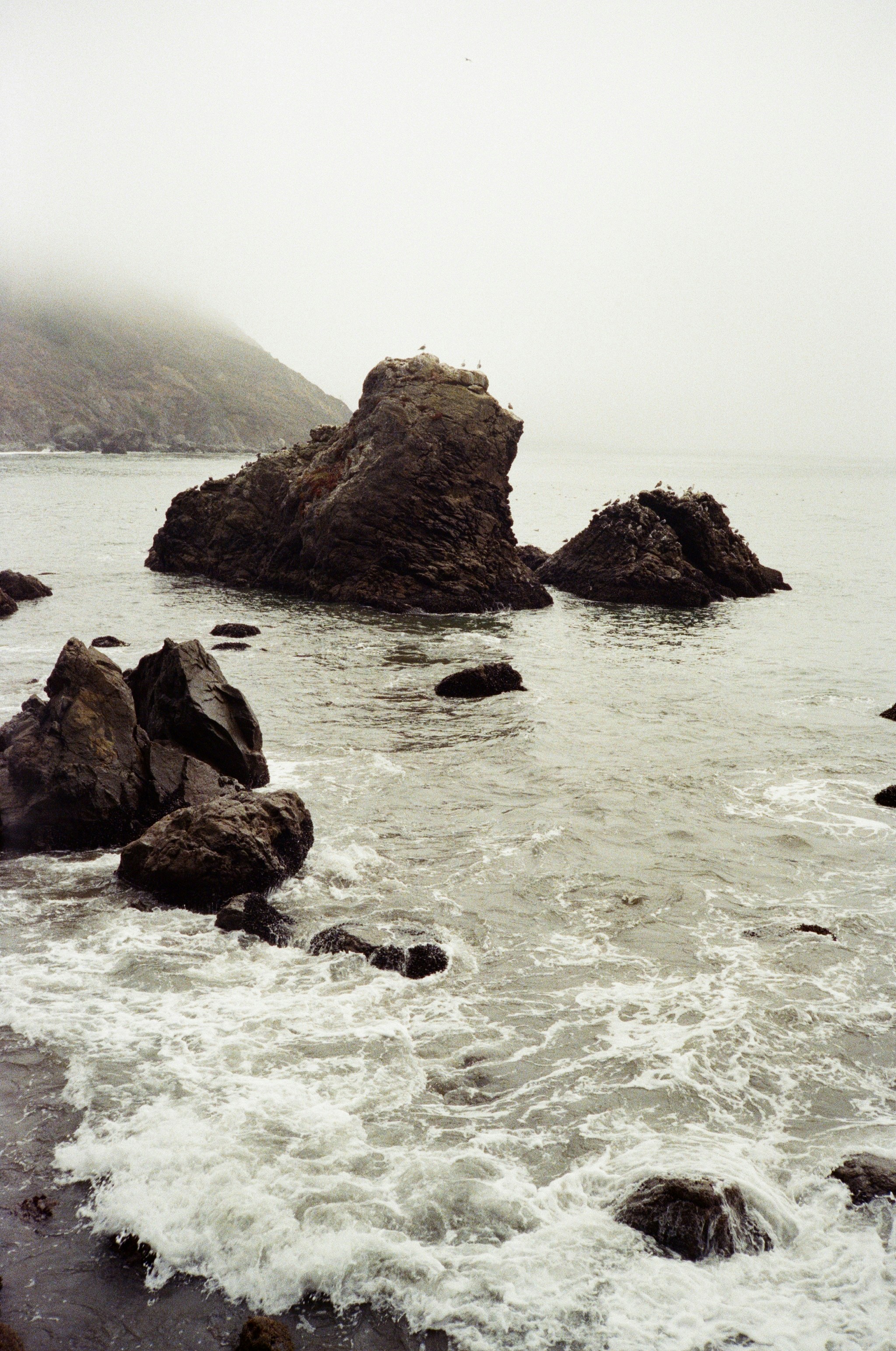 Rocky coastline with waves crashing on shore