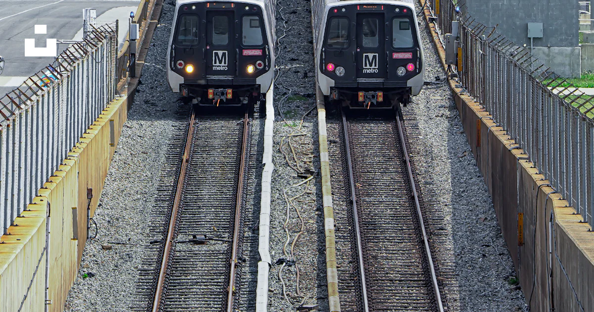 Two trains on parallel tracks approaching each other. photo – Free ...