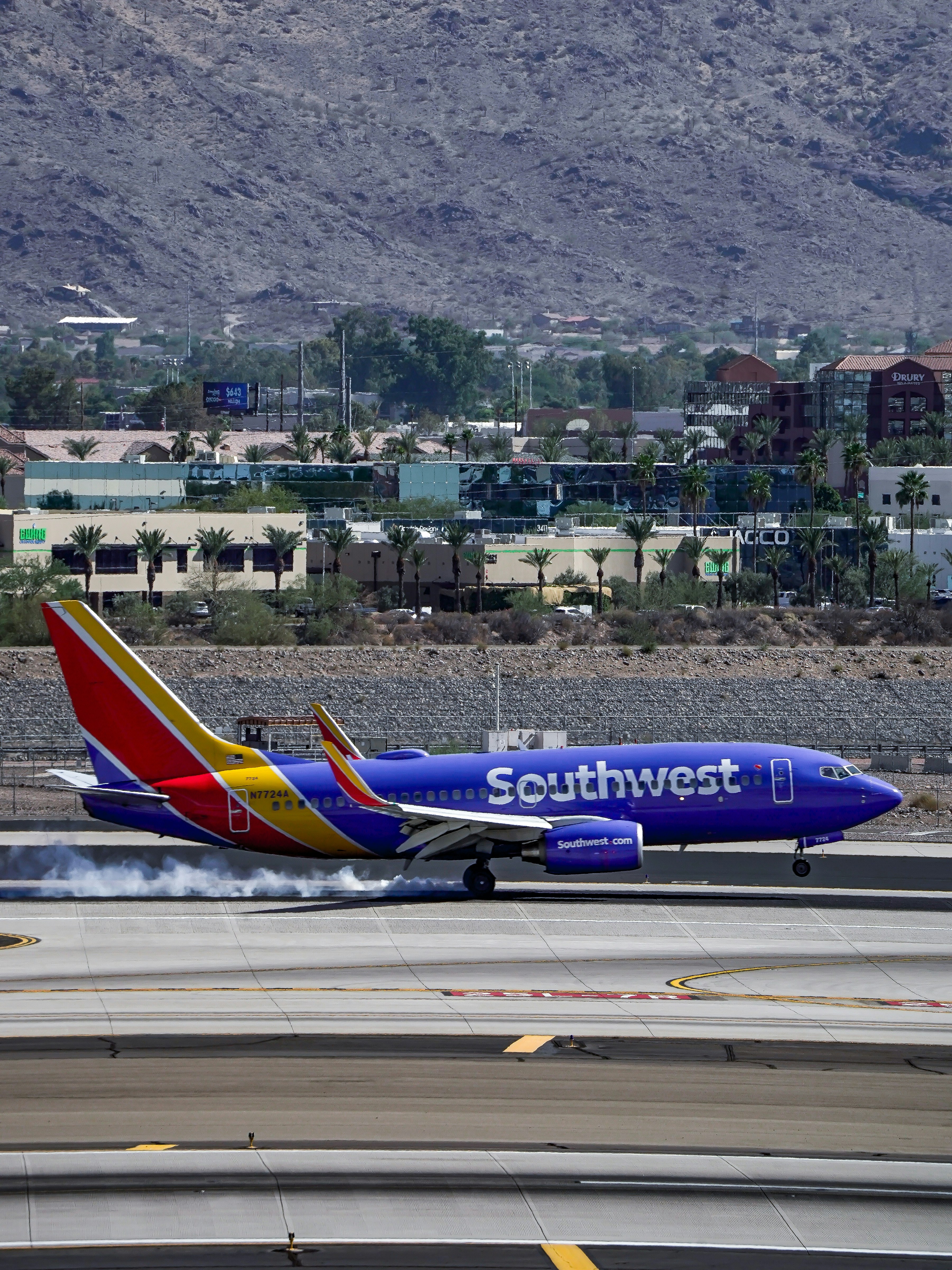 Southwest airlines airplane landing on runway