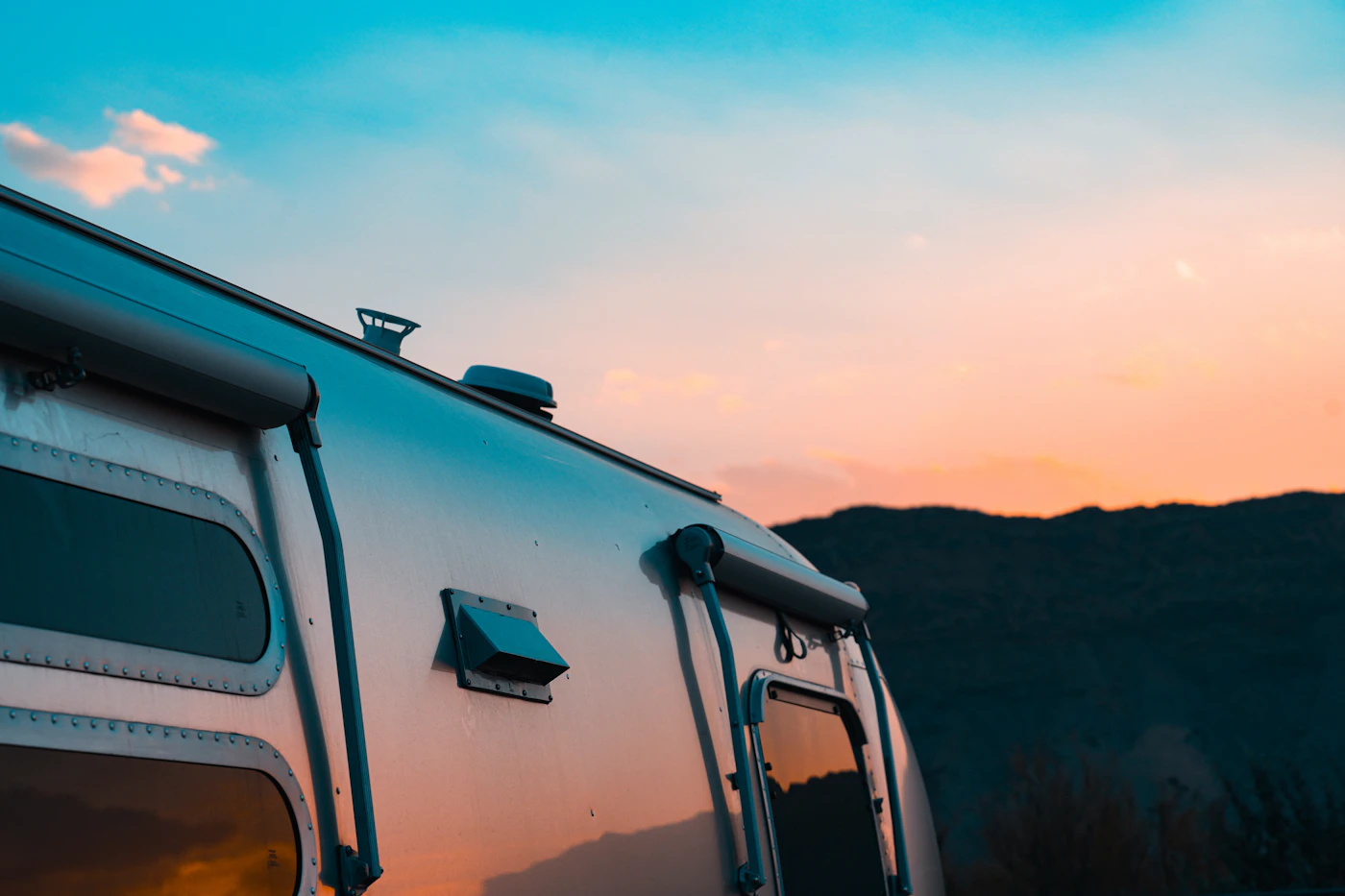 Travel trailer exterior and awning system