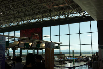 Check in desks in a bright airport terminal