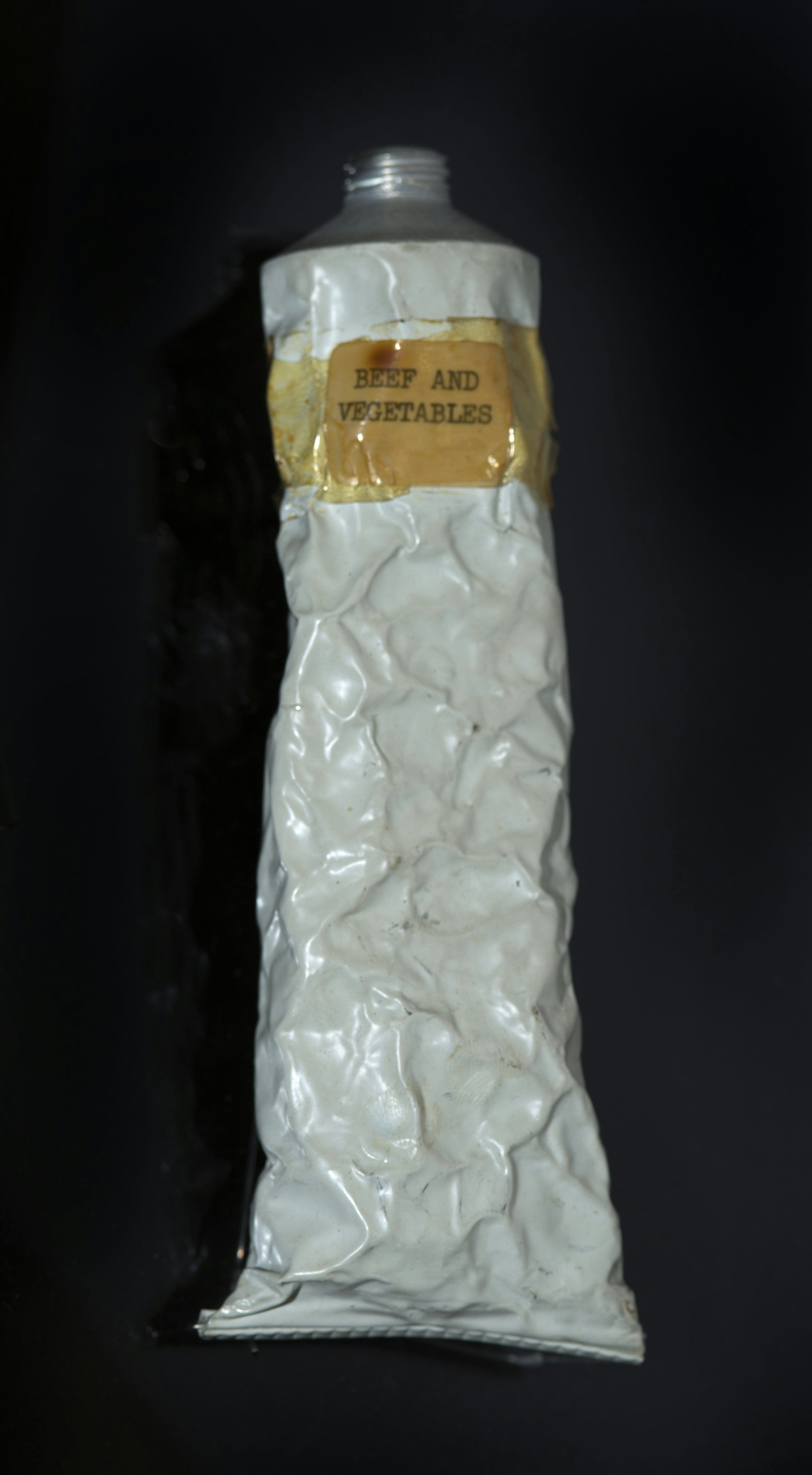 Crushed tube of beef and vegetables paste