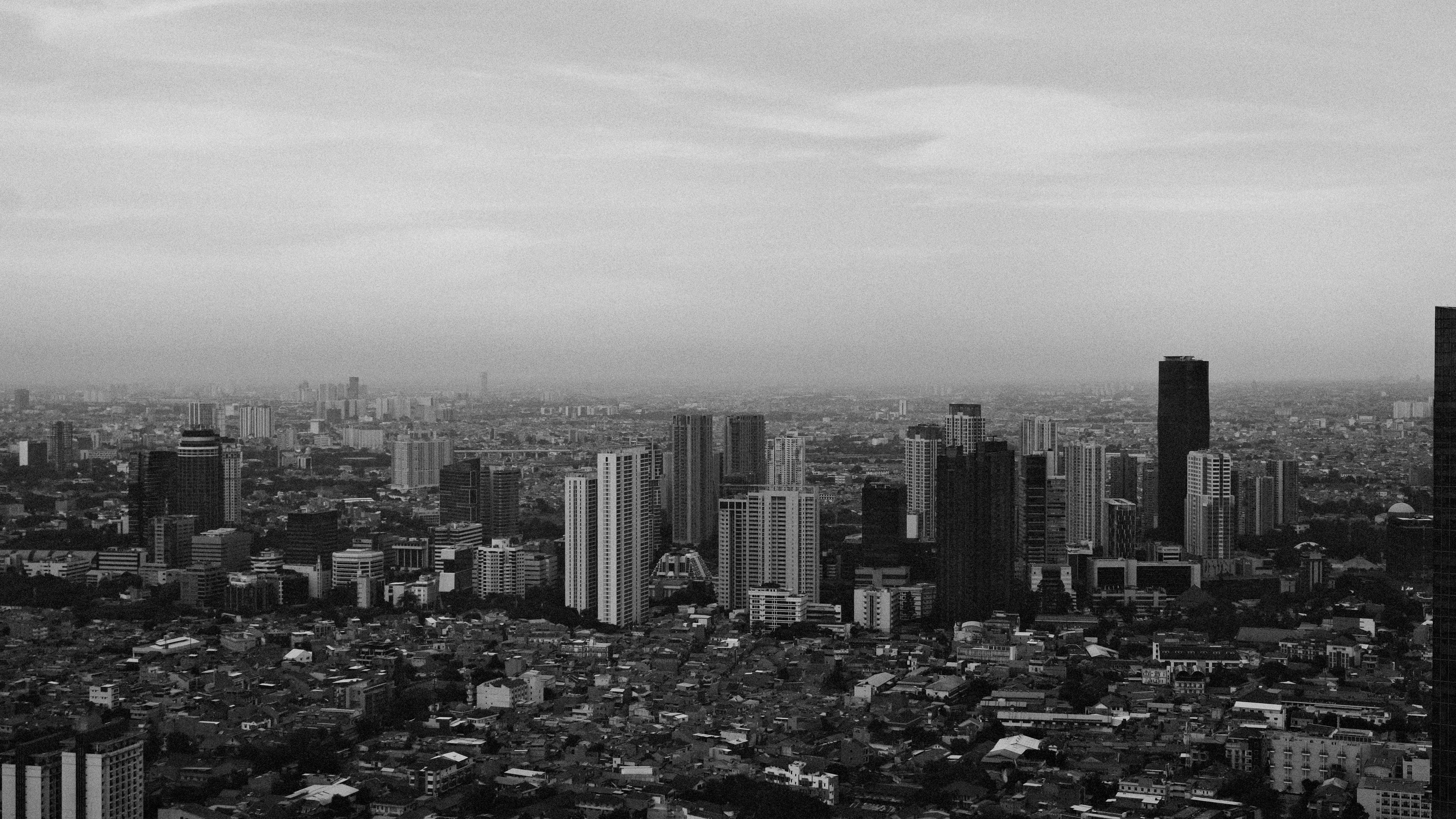 Panoramic view of a dense cityscape with skyscrapers.