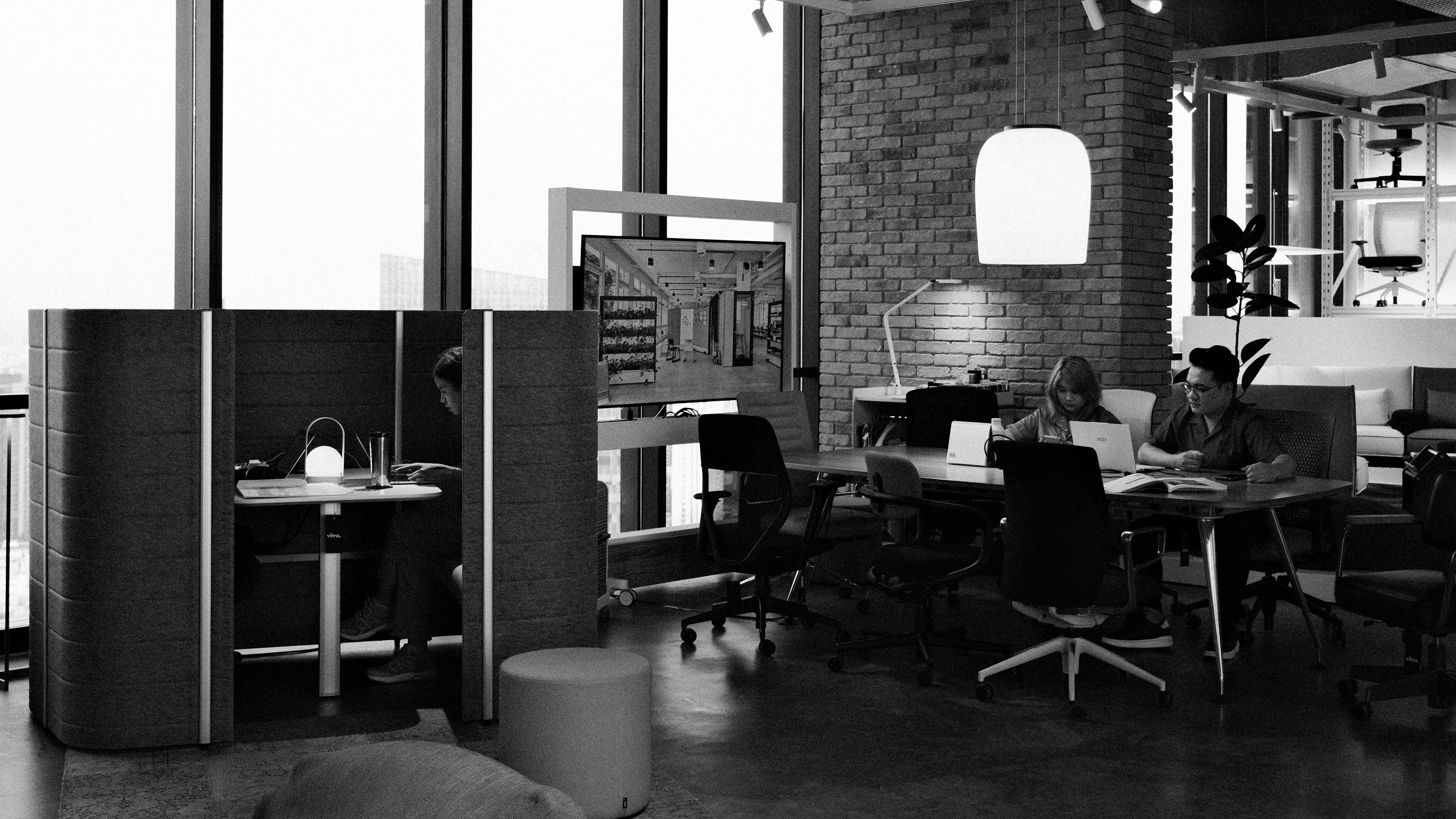 Modern office space with people working at desks
