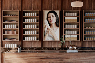 Woman holding product in a store with shelves