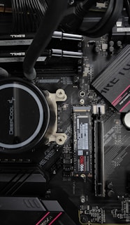 Computer motherboard with cpu cooler and ssd.