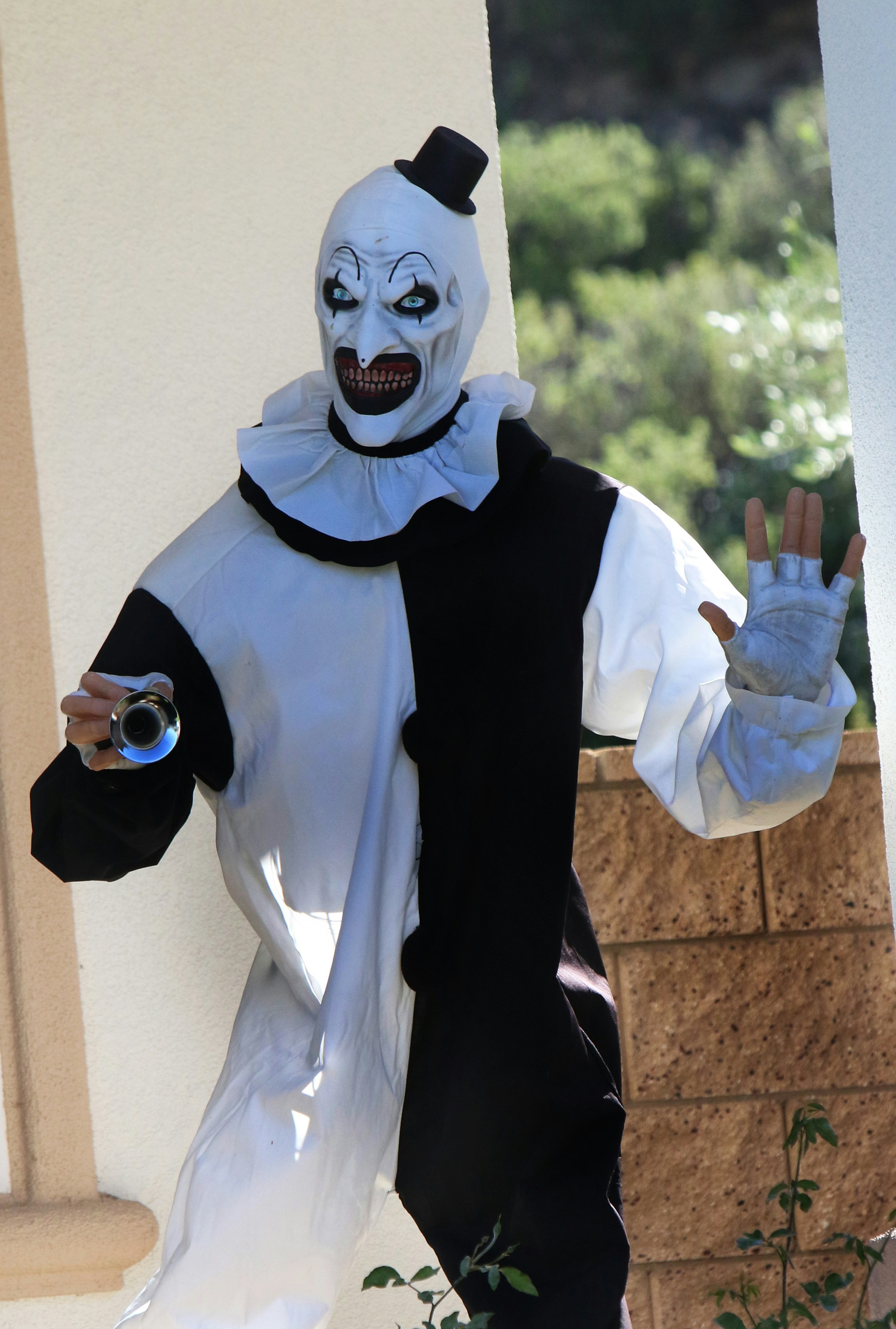 A creepy clown in a black and white costume photo  Free Halloween Image on  Unsplash