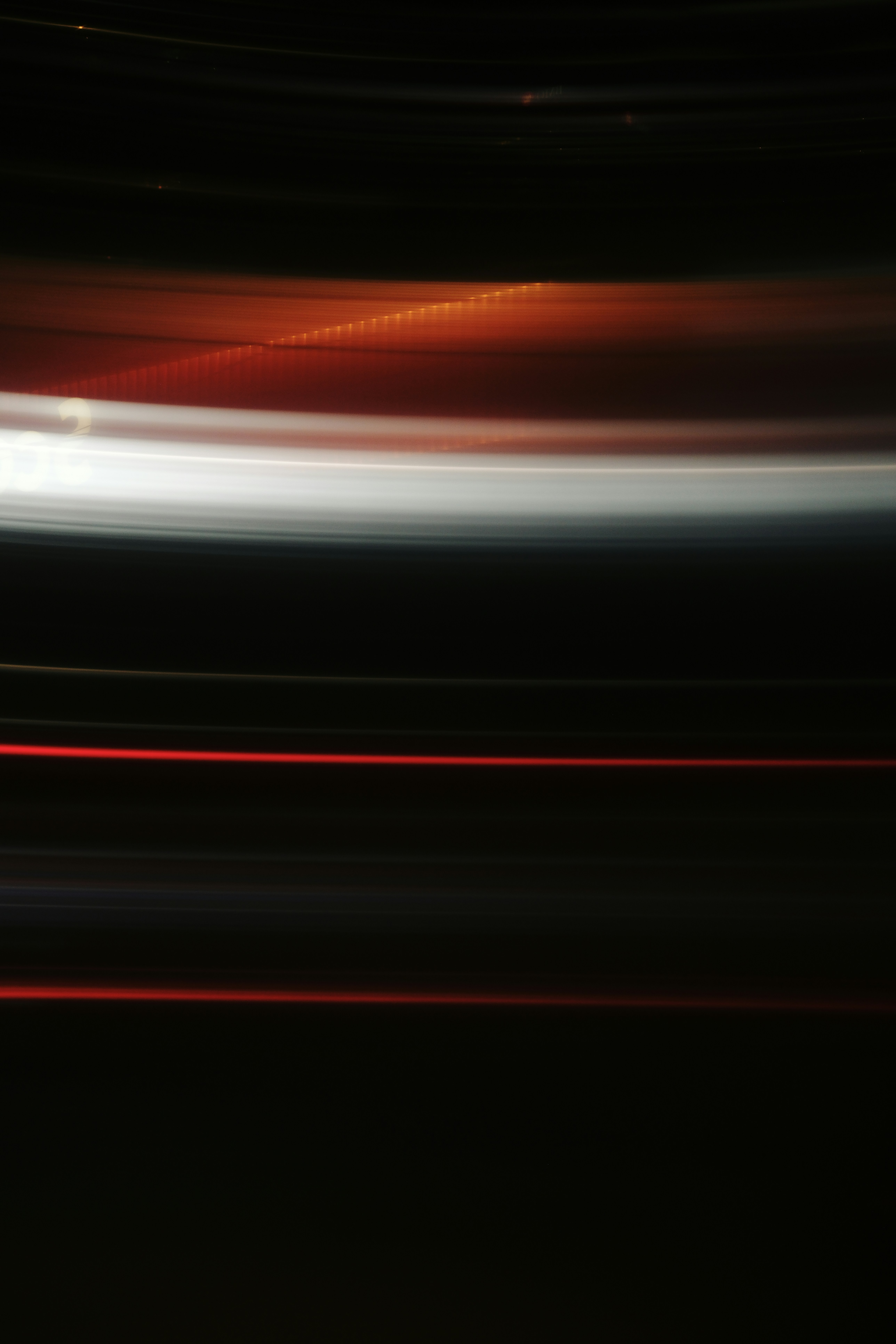 Abstract streaks of light in dark background