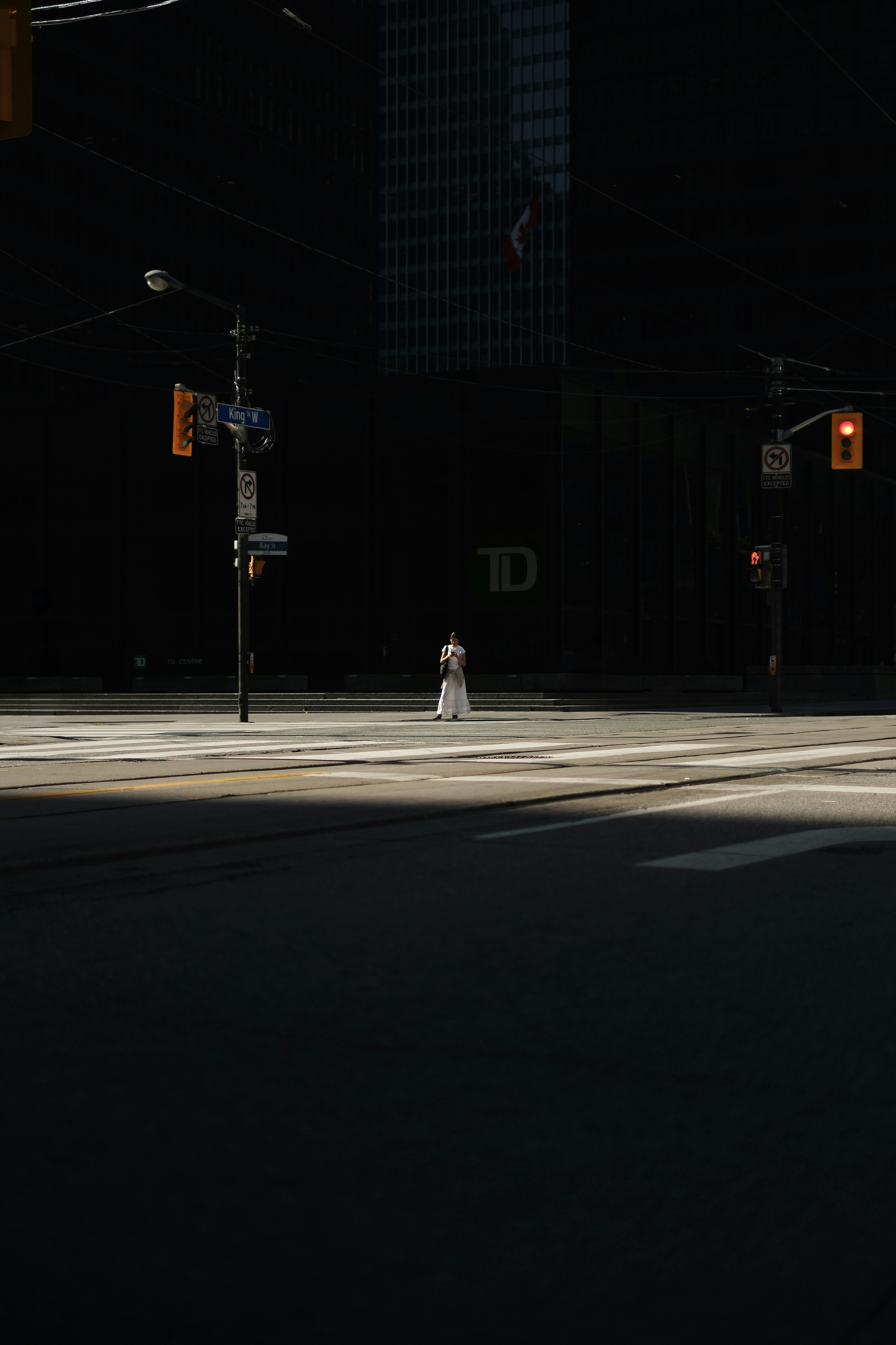 A person looking at an empty piggy bank
