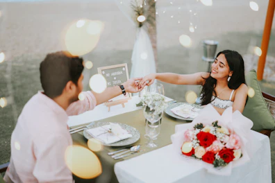 Couple enjoying a romantic dinner on the beach