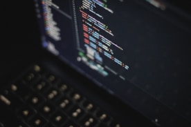 Computer screen displaying colorful code