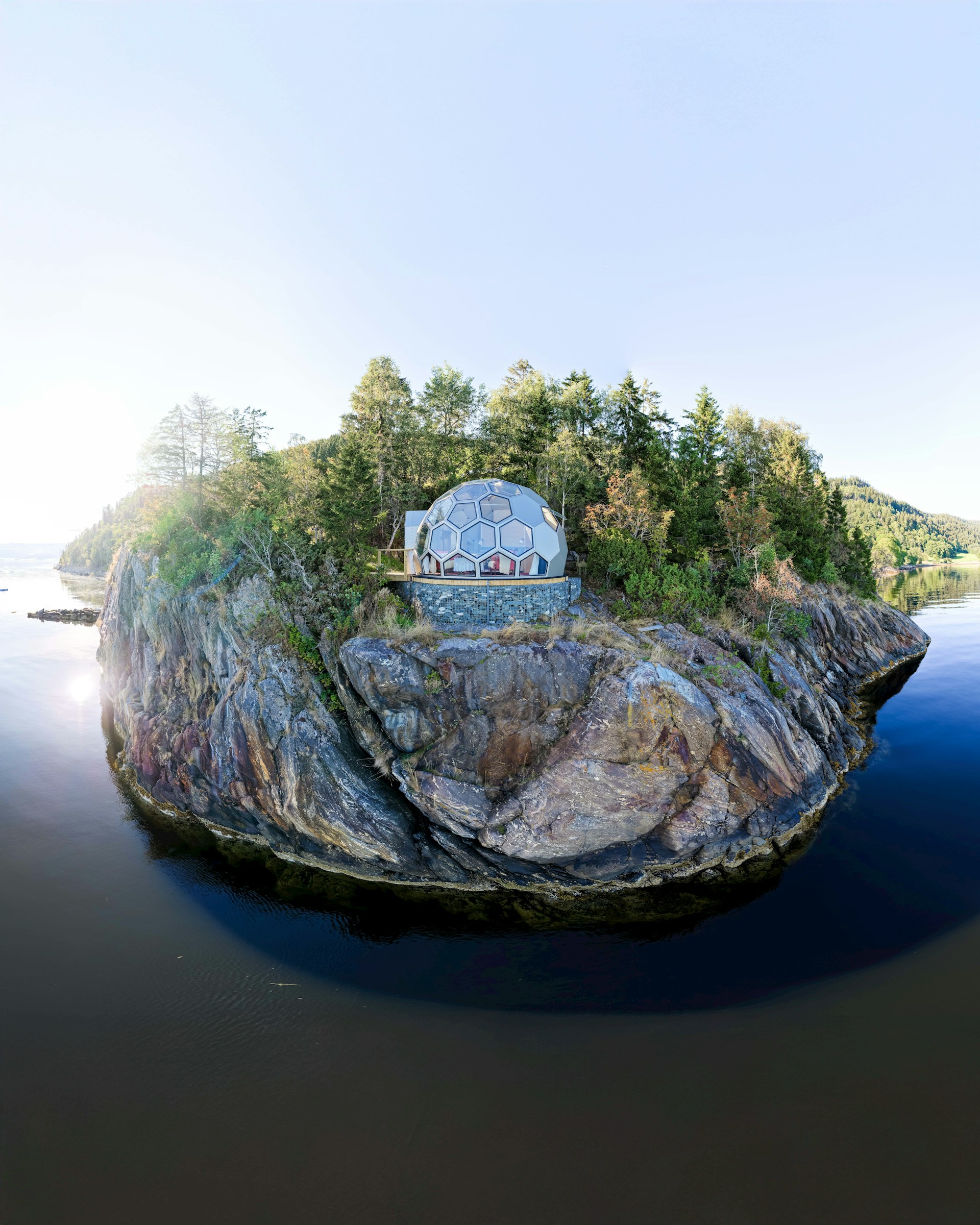 Dome structure on a rocky island surrounded by water