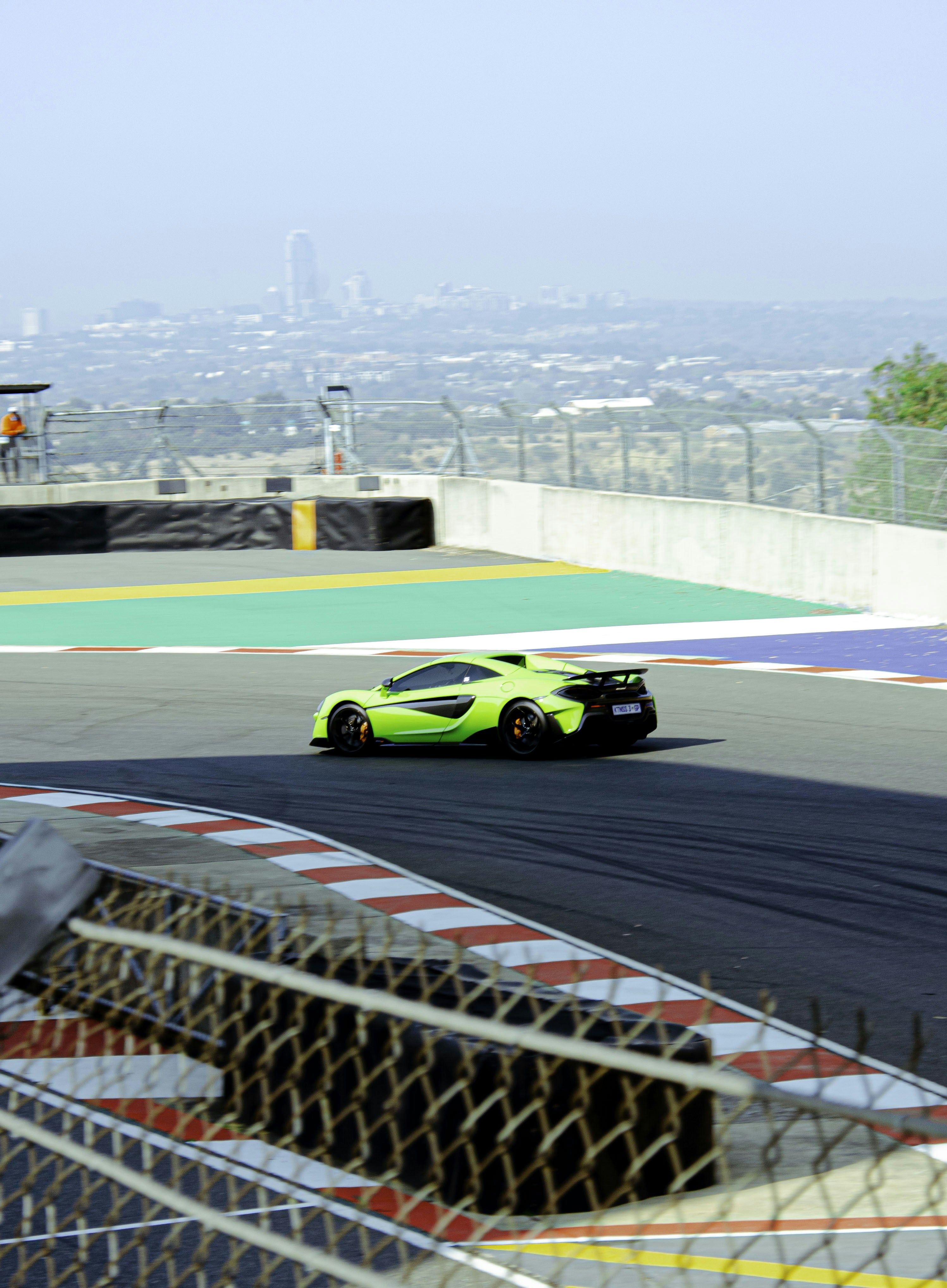 McLaren P1 GTR track, Hypercar race circuit, Luxury car asphalt, Speed blur wallpaper, ilustrasi artikel Unleash the Beast: McLaren P1 GTR 4K Race Track Wallpapers for Your Screen 3