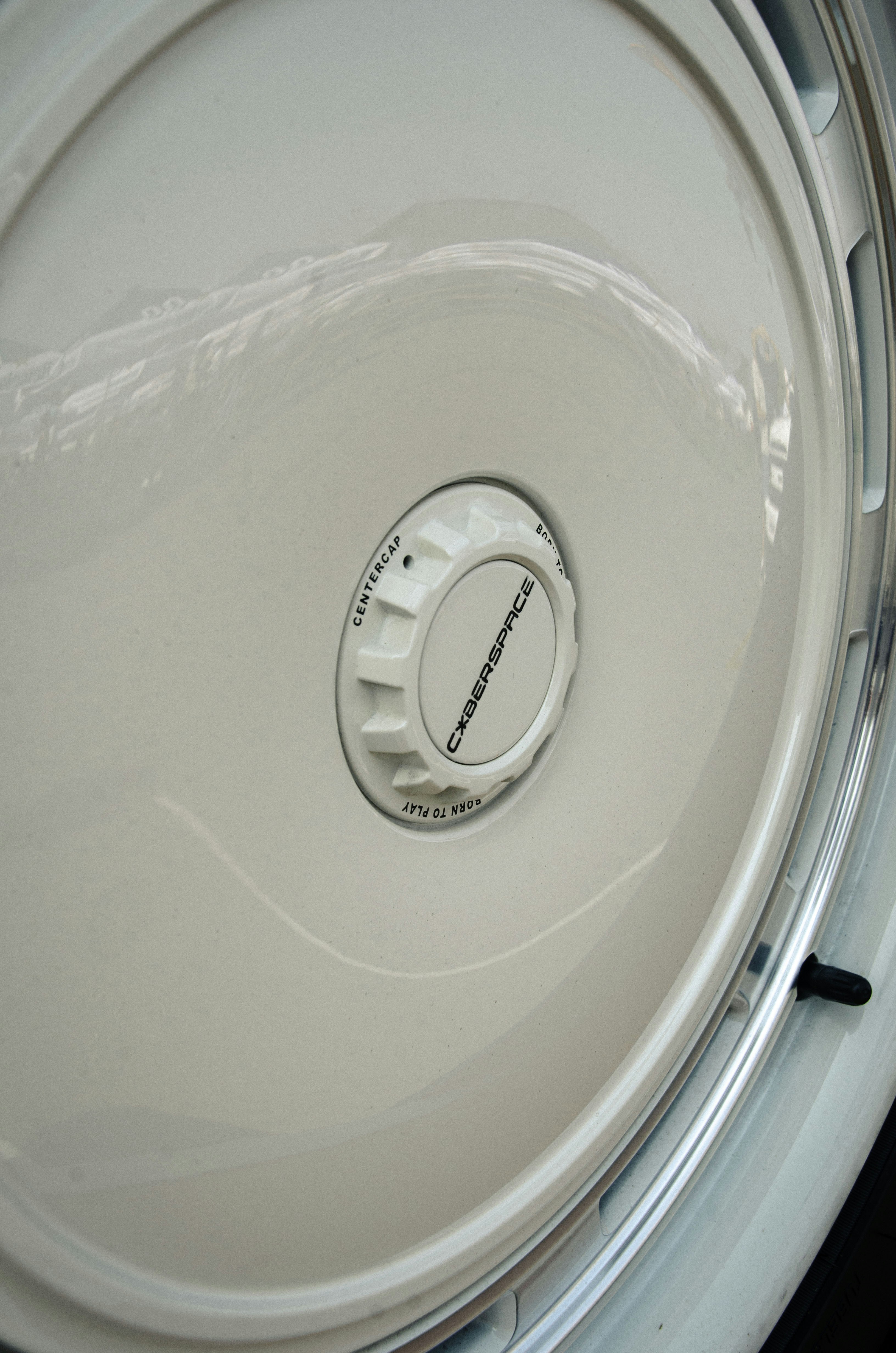 Close-up of a white circular object with a dial.