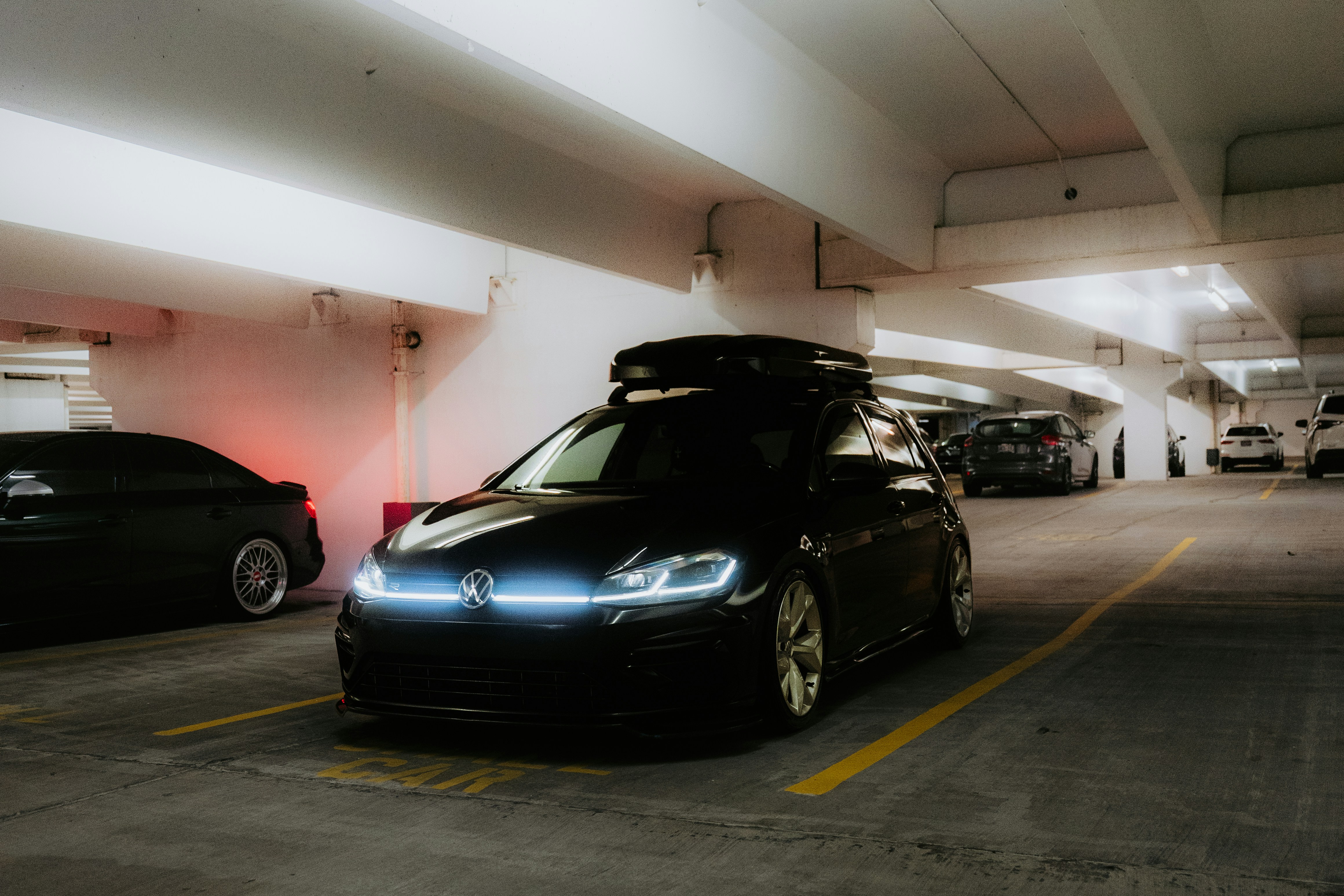 Electric vehicles charging overnight at hotel parking lot Level 2 chargers